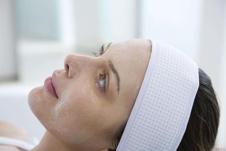 Woman getting a chemical peel facial treatment