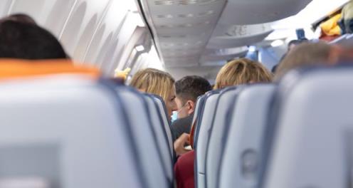 Many infectious disease experts say they will co<em></em>ntinue to wear masks while flying. Photograph: iStock