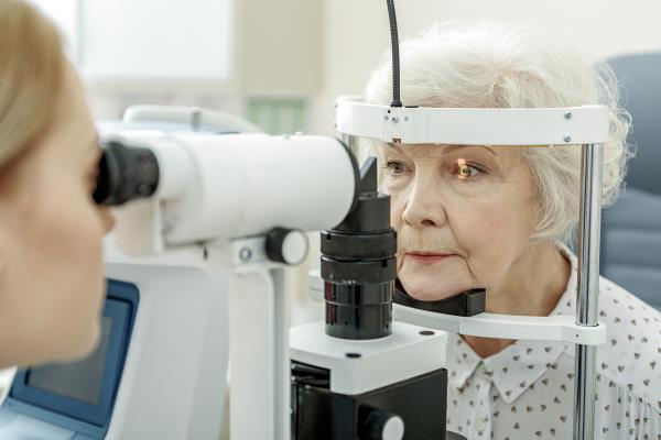 Elderly woman havin<em></em>g her eyes examined